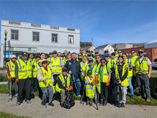 Mayor Eddie and volunteers in green vests