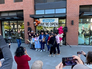 Ribbon-cutting of Wildflour with Mayor Eddie, and Wildflour owner and family