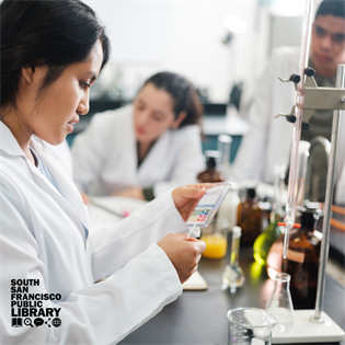 Young people in lab coats working in a lab