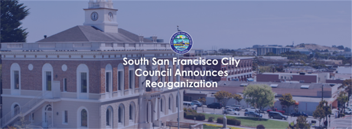 City Hall on Grand Avenue in the background with the words reading on top of it 