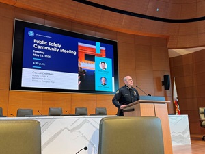 Police Chief Campbell presenting at podium