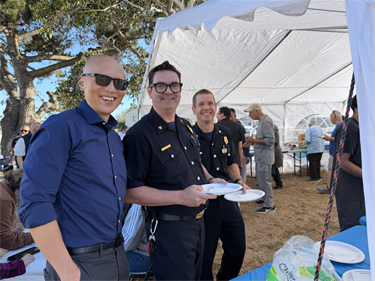 ACM-Rich-Lee-with-Fire-Chief-Matt-Samson-and-Deputy-Fire-Chief-Devin-Flannery-NNO-2026.png