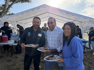Councilmember-Eddie-Flores-with-community-members-outside-NNO-2026.png