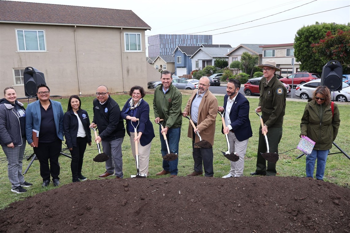 City Council with Congressman Kevin Mullin, •	Chris Spohrer, District Superintendent for Santa Cruz - State Parks Representation, and Parks & Recreation Commissioners holding shovels for the groundbreaking at the new park on Linden Ave. and Pine Ave.