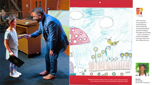 Mayor Eddie shaking hands with student winner of HIP Housing art contest
