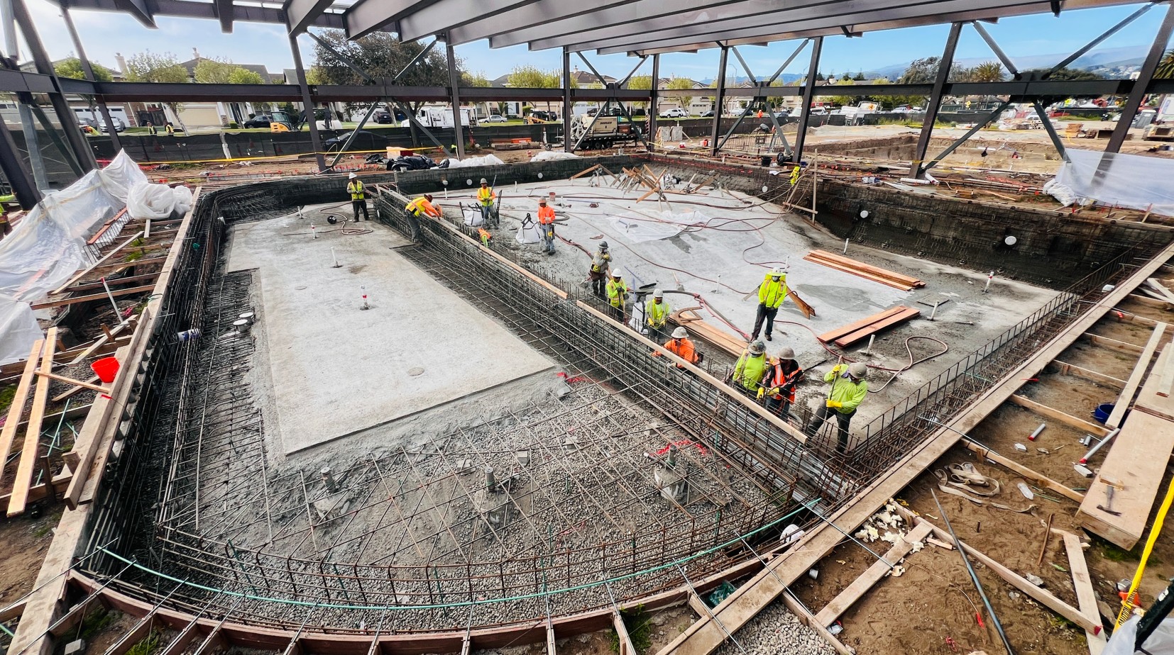 construction crew working on indoor pool