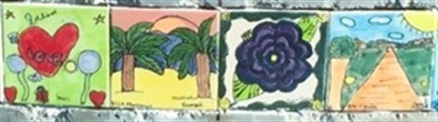 four ceramic tiles with children's art