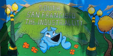 Cartoon bear with hill in background