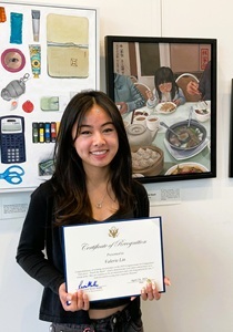 Girl holding certificate