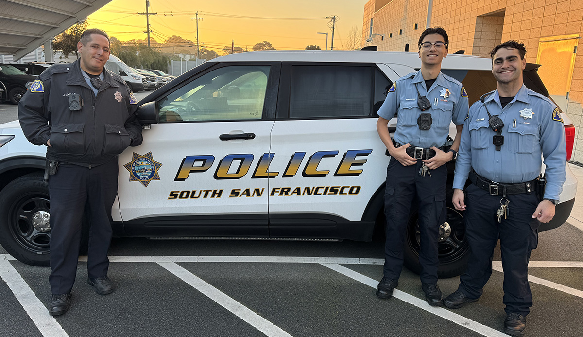 Police Service Technicians In the Station Parking Lot