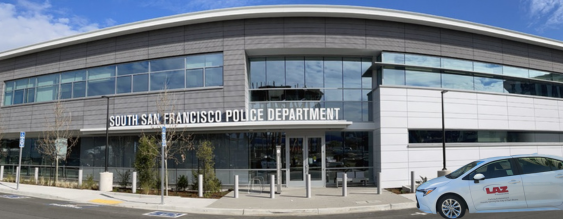 LAZ Parking Enforcement Vehicle in front of station