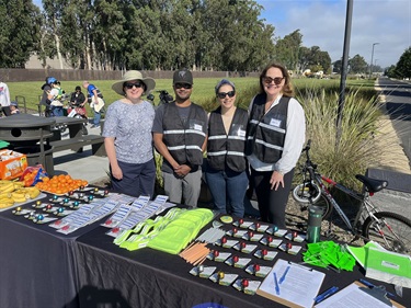 City Manager Team standing at registration table